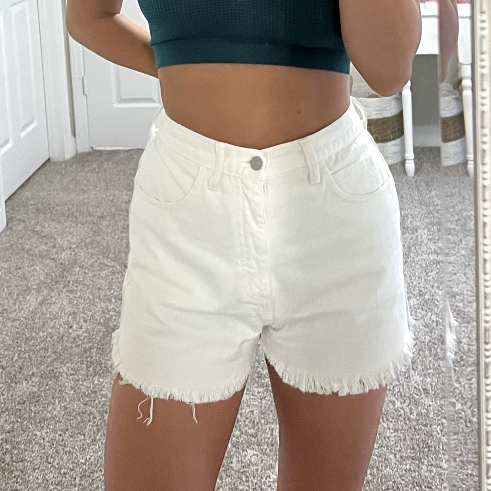 white distressed Guess denim shorts